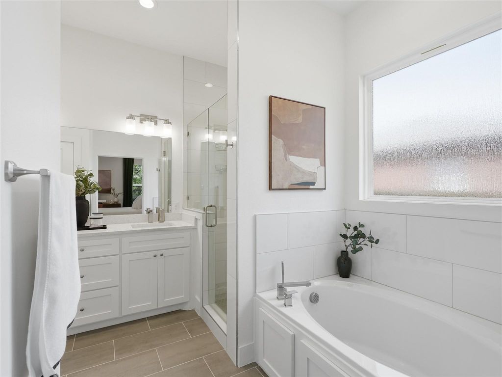 Kitchen alternate angle showing island and dining area