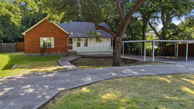 1406 S Elm St — None