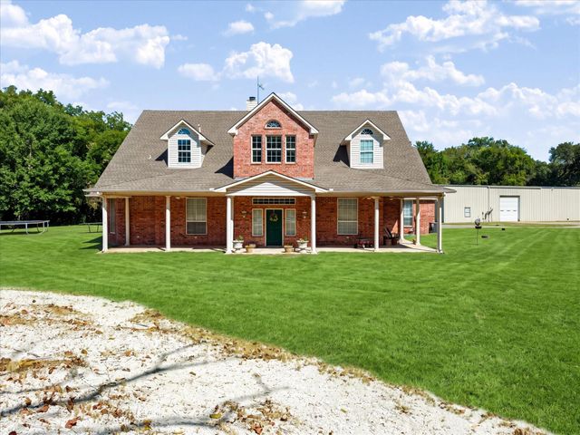 6747 County Road 424 — ABS A0784 JOHN ROWLAND SURVEY