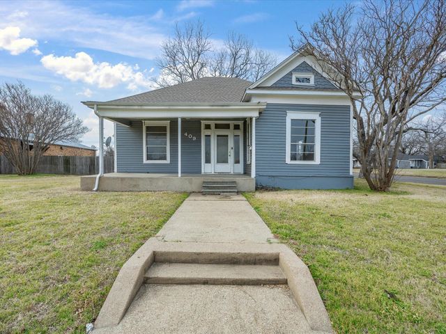 409 NW Main St — O T Ennis